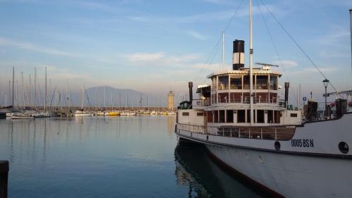 a boat docked in a marina with other boats at Trattoria Milani in Lonato del Garda
