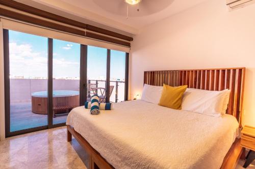 En eller flere senge i et værelse på Ipana by Casago