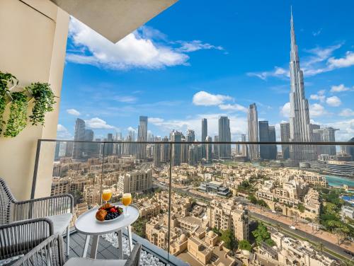 a balcony with a view of a city at SmartStay at Burj Royale - Full Burj Khalifa View - Brand New Luxury Apartments in Dubai