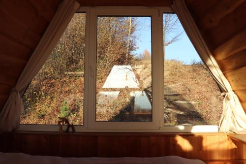 a window in a room with a view at To Lem Ande in Lumshory