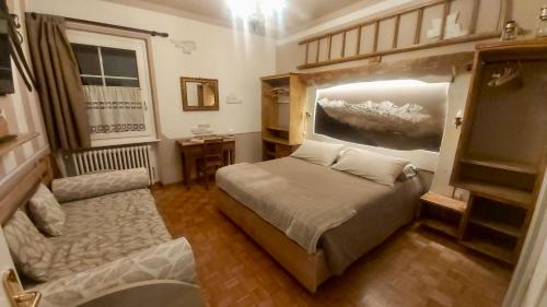 Postel nebo postele na pokoji v ubytování B&b Villa Paradiso