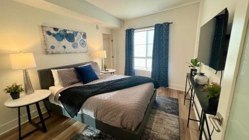 a bedroom with a bed and a window at Century City Cozy 3 Bedroom Apartment with Parking 302,303 in Los Angeles