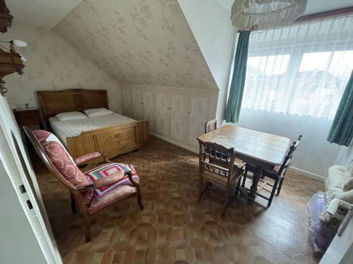 Postel nebo postele na pokoji v ubytování Aux Portes Du Parc