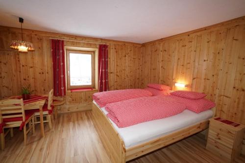 Postel nebo postele na pokoji v ubytování Haus Ruetzbach