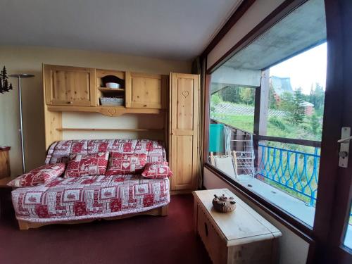 Ένα ή περισσότερα κρεβάτια σε δωμάτιο στο Le RUITOR