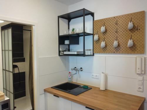 Η κουζίνα ή μικρή κουζίνα στο Appartement Valentino
