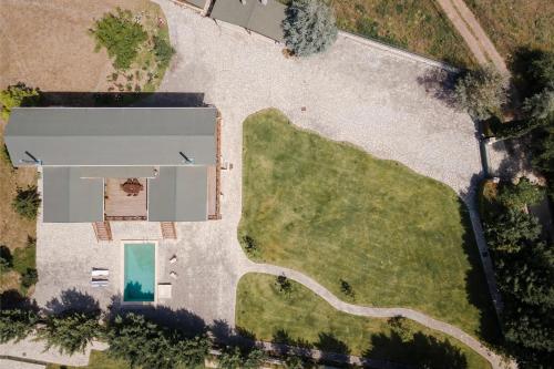 an aerial view of a building in a yard at Chalet Styga Kalavrita in Kalavrita