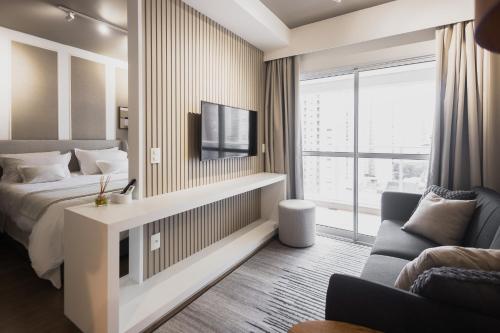 Postel nebo postele na pokoji v ubytování Elegância e Conforto no Ed Jh Palhano 1303