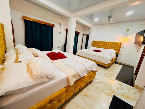 Postel nebo postele na pokoji v ubytování Hotel Glorial