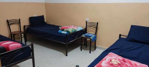 Katil atau katil-katil dalam bilik di Mirana Mayotte Hostel 47
