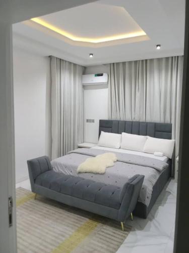 Кровать или кровати в номере Short-stay Haven