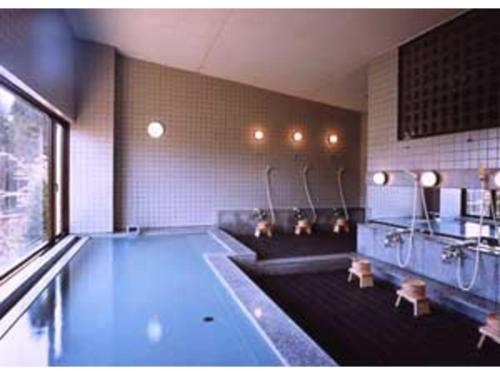 Bazén v ubytování Utsunomiya Inter Resort Hotel - Vacation STAY 68891v nebo v jeho okolí