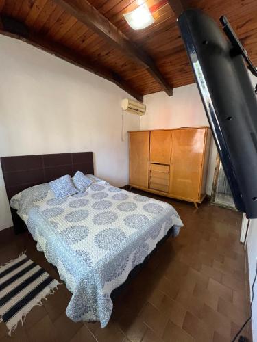 Ένα ή περισσότερα κρεβάτια σε δωμάτιο στο Casa YRIGOYEN