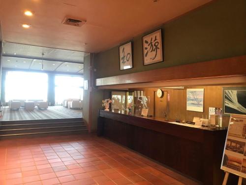 a restaurant lobby with a counter and a waiting room at Hotel Kaishunro - Vacation STAY 47965v in Hamamatsu