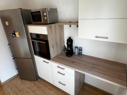 Kuchyň nebo kuchyňský kout v ubytování Hotel Wettlaufer