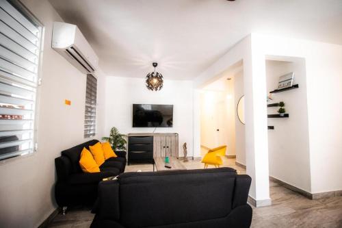 Μια τηλεόραση ή/και κέντρο ψυχαγωγίας στο San Juan Vacation Home