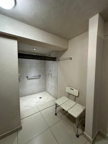 Ein Badezimmer in der Unterkunft Hotel Velario