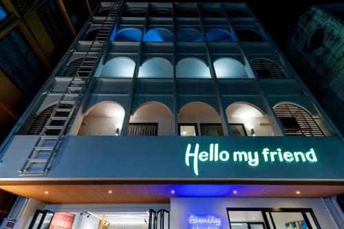 a building with a hello friend sign on it at Hello my friend in Bang Bua Thong Railway Station