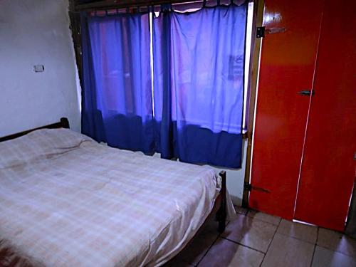 Postel nebo postele na pokoji v ubytování Hostel Mi Lugar