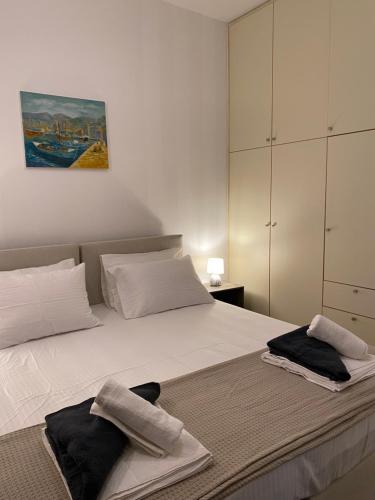 Ένα ή περισσότερα κρεβάτια σε δωμάτιο στο Be Crete - Zen apartment 2 rooms