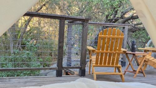 a pair of chairs sitting on a deck at Splitrock - The Portal in Fallbrook