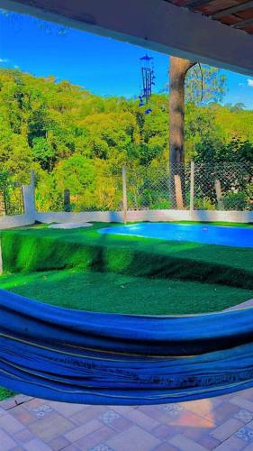 a golf ball in the middle of a golf course at Sítio das Palmeiras in Itapecerica da Serra