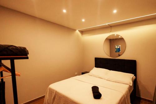 Postel nebo postele na pokoji v ubytování Hermoso LOFT en Guaduas