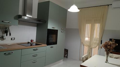 Kuchyň nebo kuchyňský kout v ubytování Casa Latiini A