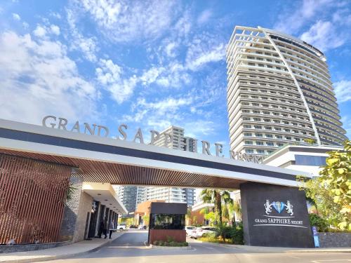 a large building with a sign that reads grand santa fe at Exclusive 2 Bedroom Apartment in Grand Sapphire Resort Iskele in Iskele