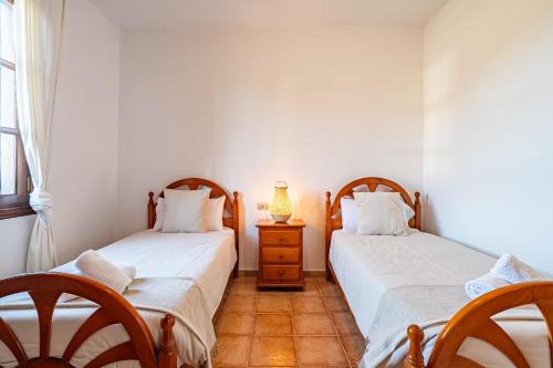 Ένα ή περισσότερα κρεβάτια σε δωμάτιο στο Casa Origen