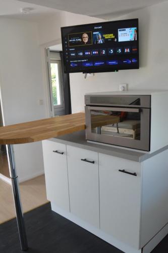 Kuchyň nebo kuchyňský kout v ubytování Appartement modulable