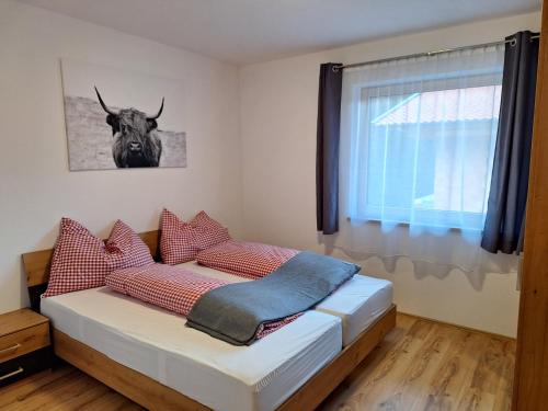 Postel nebo postele na pokoji v ubytování Bergblick Apartments