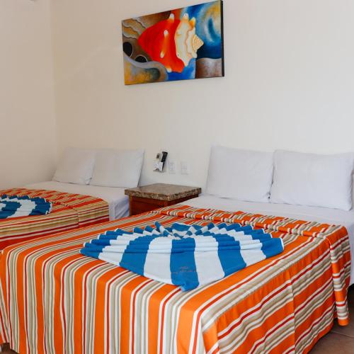 Postel nebo postele na pokoji v ubytování Auroza Resort