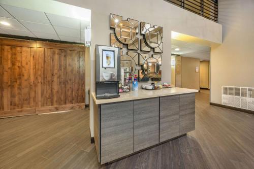 a lobby with a reception desk in a building at Best Western Plus North Las Vegas Inn & Suites in Las Vegas