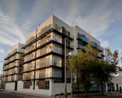 Edificio en el que se encuentra la habitación en casa particular