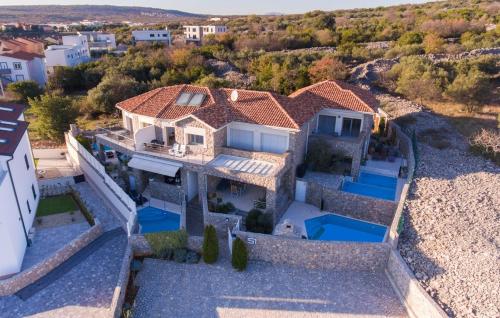 Holiday house with a swimming pool Krk - 23581
