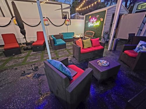 a group of chairs and tables in front of a tent at Gallego Deluxe Rental in Key Largo