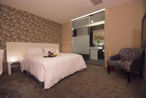 Postel nebo postele na pokoji v ubytování Hotel Purity