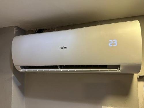 a laptop computer sitting on top of an oven at SS Grey Hotel Bukit Bintang in Kuala Lumpur
