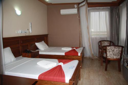 Postel nebo postele na pokoji v ubytování Pavilion Holiday Resort