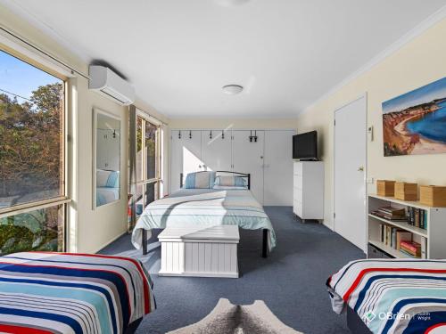 Una cama o camas en una habitación de Ventnor Vista