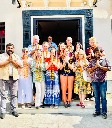 a group of people standing in front of a building at Kotra Haveli A Boutique Hotel by Lake Pichola in Udaipur