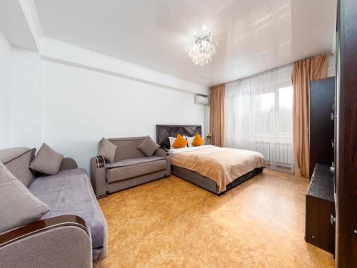 Katil atau katil-katil dalam bilik di Apartment оn Makatayeva 5 b