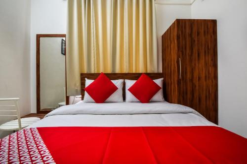 Ένα ή περισσότερα κρεβάτια σε δωμάτιο στο Hotel O Kanchan Residency