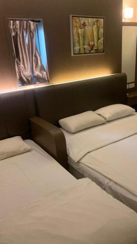 Кровать или кровати в номере Araabian Boutique Hotel