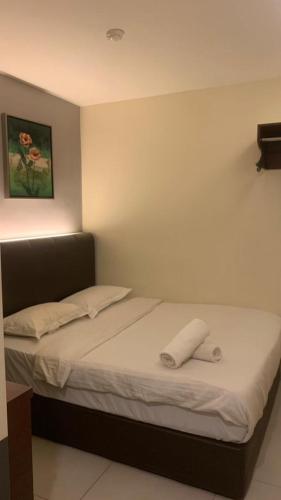 Кровать или кровати в номере Araabian Boutique Hotel
