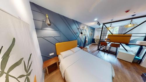 Postel nebo postele na pokoji v ubytování Sun Inns Hotel Subang