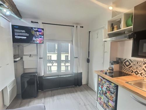 Photo de la galerie de l'établissement Beau Studio Calme Gare et Métro à 300m, à Paris