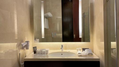 Ванная комната в City Garden Grand Hotel