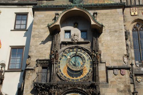a large clock on the side of a building at Apartmany Chodov in Prague